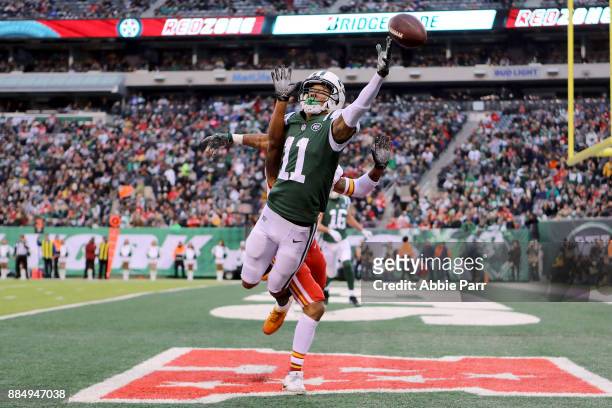 Robby Anderson of the New York Jets reaches for what would be an incomplete pass in the fourth quarter against the Kansas City Chiefs during their...