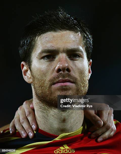 Xabi Alonso of Spain stands for the national anthem prior to the FIFA Confederations Cup match between New Zealand and Spain at Royal Bafokeng...