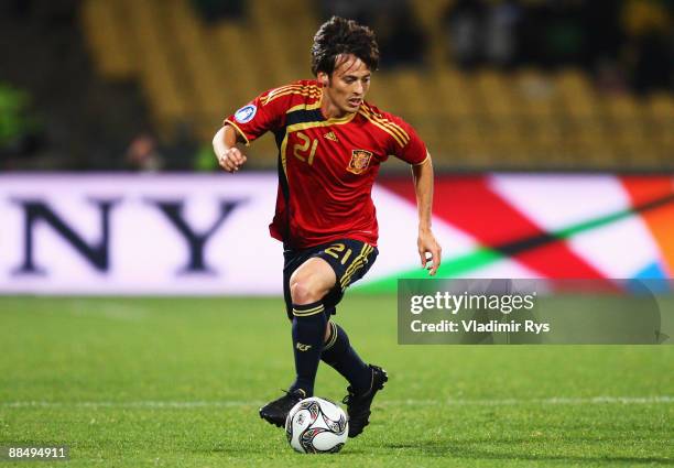 David Silva of Spain runs with the ball during the FIFA Confederations Cup match between New Zealand and Spain at Royal Bafokeng Stadium on June 14,...