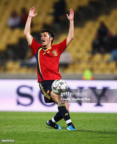 David Villa of Spain reacts during the FIFA Confederations Cup match between New Zealand and Spain at Royal Bafokeng Stadium on June 14, 2009 in...