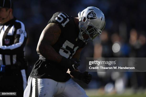 Bruce Irvin of the Oakland Raiders reacts after a play against the New York Giants during their NFL game at Oakland-Alameda County Coliseum on...