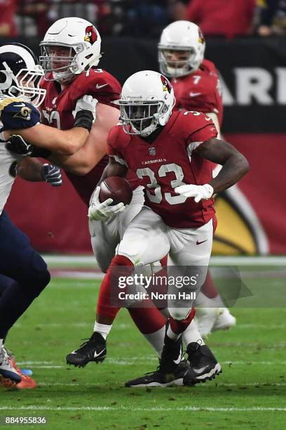 Running back Kerwynn Williams of the Arizona Cardinals runs during the first half of the NFL game against the Los Angeles Rams at the University of...