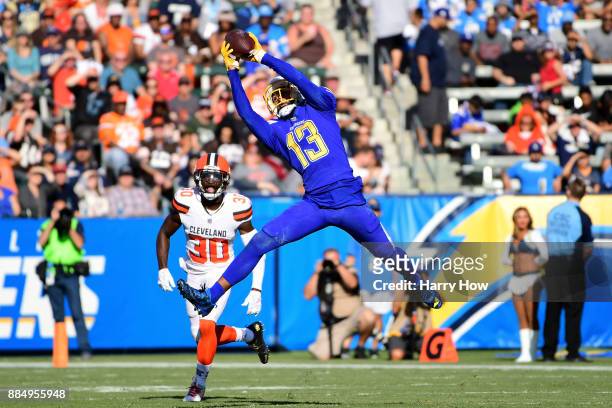 Keenan Allen of the Los Angeles Chargers matches the catch in front Jason McCourty of the Cleveland Browns for a first down during the second quarter...