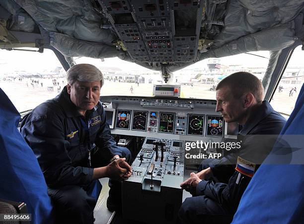 Pilots of the Russian Sukhoi Superjet 100 answers journalists's questions in the cockpit of the plane, during the week long 48th international Paris...