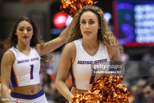 Boise State Broncos cheerleader performs during second half action between the Portland Pilots and the Boise State Broncos on December 3, 2017 at...