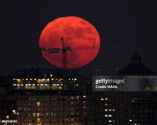 In this handout provided by NASA, the moon is seen as it rises on December 3, 2017 in Washington, DC. Today's full Moon is the first of three...