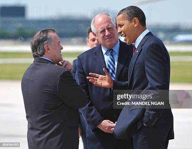 President Barack Obama chats with Chicago Mayor Richard Daley and Illionois Governor Pat Quinn after stepping off Air Force One on June 15, 2009 upon...