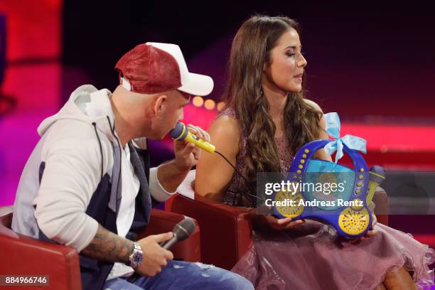 Sarah Engels and Pietro Lombardi are seen on stage at '2017! Menschen, Bilder, Emotionen' TV Show on December 3, 2017 in Huerth, Germany.