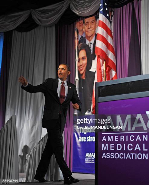 President Barack Obama makes his way onto the stage on June 15, 2009 to address the American Medical Association�s annual conference at a hotel in...