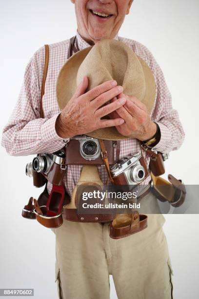 Mann mit kameras aus den fünfzigern