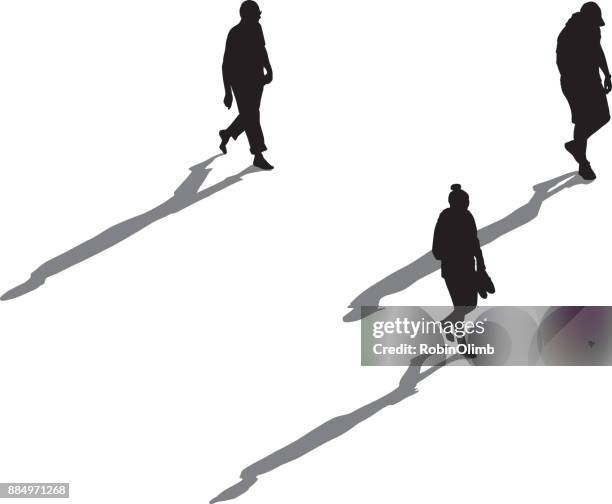 three people walking with long shadows - shadow stock illustrations