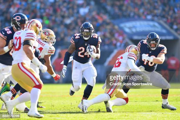 Chicago Bears running back Jordan Howard runs up the middle with the football during the game between the Chicago Bears and the San Francisco 49ers...