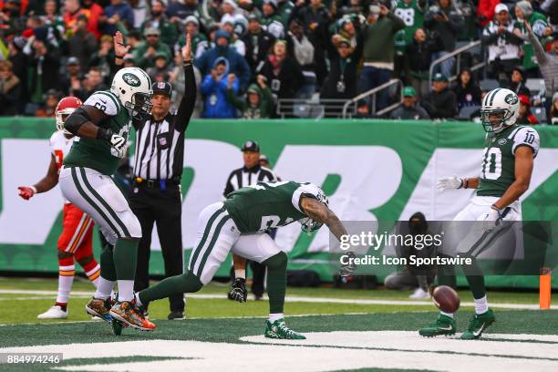 New York Jets running back Matt Forte spikes the ball after he scores a touchdown during the second quarter of the National Football League game...