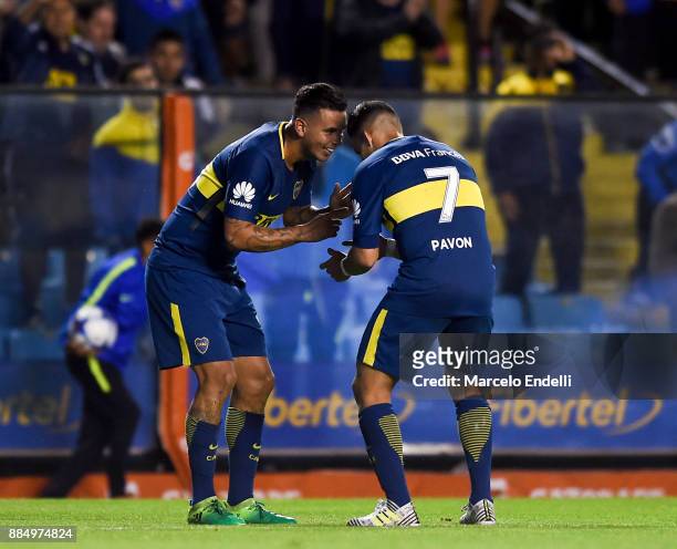Edwin Cardona of Boca Juniors celebrates with Cristian Pavon after scoring the second goal of his team during a match between Boca Juniors and...