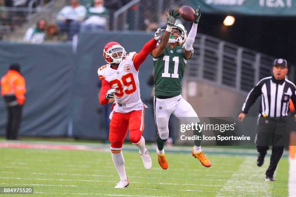 New York Jets wide receiver Robby Anderson makes a catch over Kansas City Chiefs cornerback Terrance Mitchell makes a catch and run during the third...