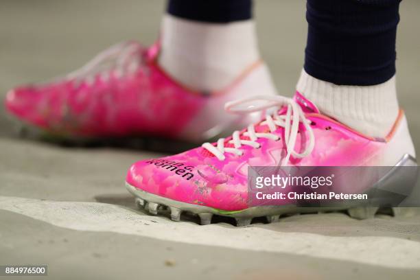 Wide receiver Tavon Austin of the Los Angeles Rams wears shoes in honor of the Susan G. Komen Foundation during the NFL game against the Arizona...
