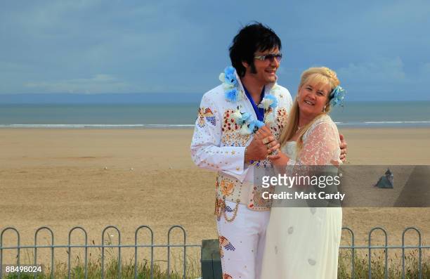 Professional Elvis tribute artist Steve Caprice marries his 'fiancee' Barbara Caprice in a recreation of the wedding scene from Blue Hawaii on June...