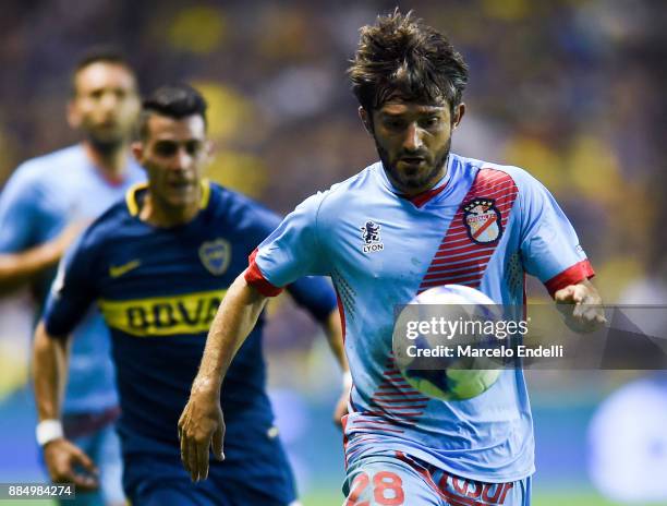 Emiliano Papa of Arsenal drives the ball during a match between Boca Juniors and Arsenal as part of the Superliga 2017/18 at Alberto J. Armando...