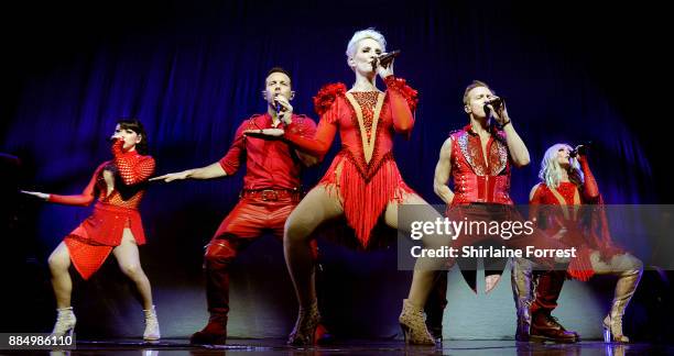 Ian 'H' Watkins, Lisa Scott-Lee, Claire Richards, Faye Tozer and Lee Latchford-Evans of Steps perform live on stage at Manchester Arena on December...