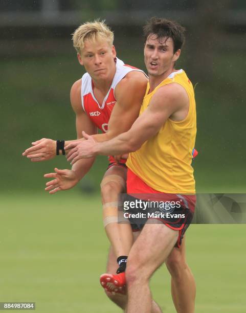 Isaac Heeney gets a kick away during a Sydney Swans AFL pre-season training session at Weigall Sports Ground on December 4, 2017 in Sydney, Australia.