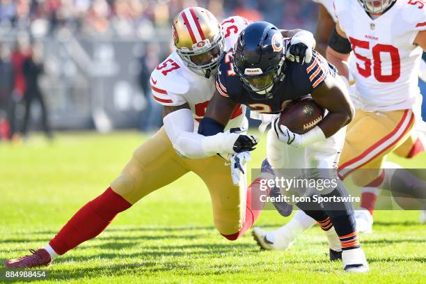 San Francisco 49ers outside linebacker Eli Harold tackles Chicago Bears running back Jordan Howard during the game between the Chicago Bears and the...