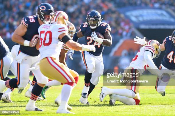 Chicago Bears running back Jordan Howard runs up the middle with the football during the game between the Chicago Bears and the San Francisco 49ers...