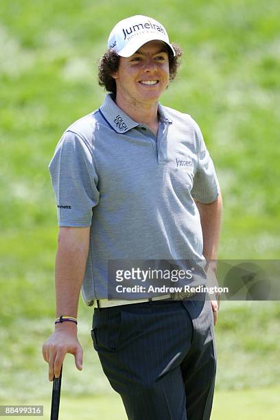 Rory McIlroy of Northern Ireland smiles during the first day of previews to the 109th U.S. Open on the Black Course at Bethpage State Park on June...