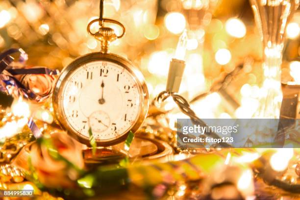 new year's eve holiday party, pocket watch, clock at midnight. - new years eve 2019 stock pictures, royalty-free photos & images