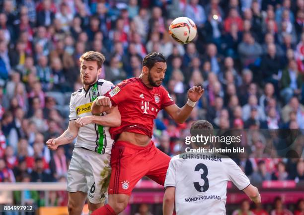 Mehdi Benatia im Kopfballduell mit Hasard Nordtveit waehrend dem Fussball Bundesliga Spiel FC Bayern Muenchen gegen Borussia Moenchengladbach am 32....