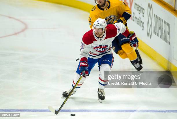 Joe Morrow of the Montreal Canadiens skates against the Nashville Predators during an NHL game at Bridgestone Arena on November 22, 2017 in...
