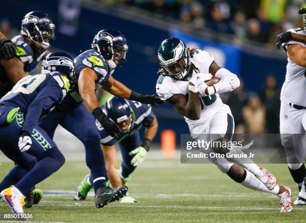 Running back Jay Ajayi of the Philadelphia Eagles rushes against middle linebacker Bobby Wagner of the Seattle Seahawks in the second quarter at...