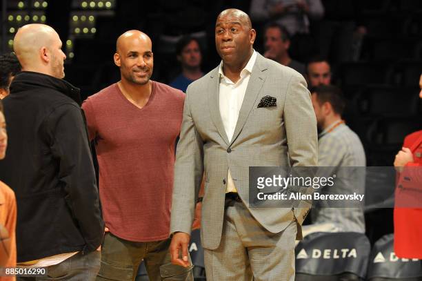 Actor Boris Kodjoe and Magic Johnson attend a basketball game between the Los Angeles Lakers and the Houston Rockets at Staples Center on December 3,...