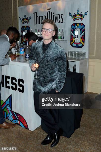 Tyler Oakley toasts with Three Olives Vodka in support of The Trevor Project at TrevorLIVE Gala at The Beverly Hilton Hotel on December 3, 2017 in...