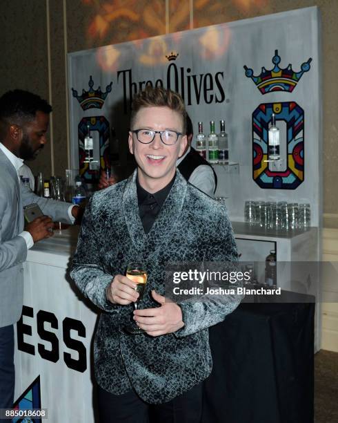 Tyler Oakley toasts with Three Olives Vodka in support of The Trevor Project at TrevorLIVE Gala at The Beverly Hilton Hotel on December 3, 2017 in...