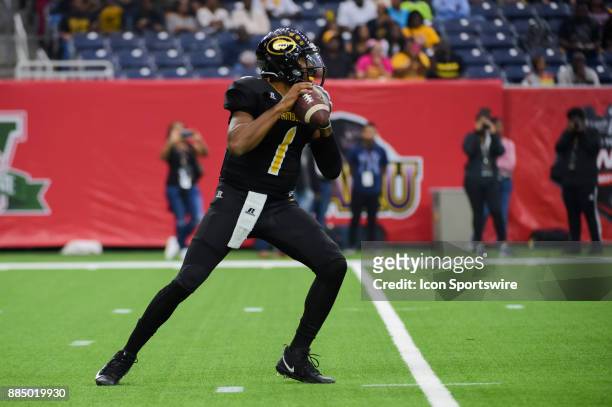 Grambling State Tigers quarterback Devante Kincade looks to pass downfield during the SWAC Championship football game between the Alcorn State Braves...