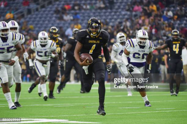 Grambling State Tigers quarterback Devante Kincade rushes for a first half touchdown during the SWAC Championship football game between the Alcorn...