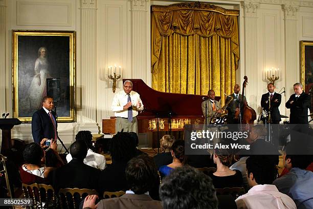 Jazz musicians Ellis Marsalis speaks as Wynton Marsalis, Branford Marsalis, Eric Revis, Delfeayo Marsalis, and Paquito D'Rivera look on during a...