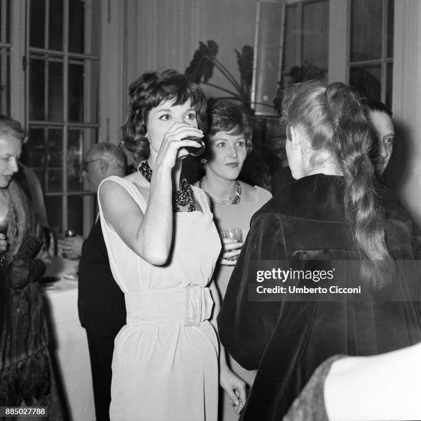 Actresses Elsa Martinelli and Carla del Poggio at the party for the movie 'The Tempest', Italy 1958.
