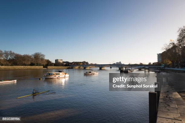 river thames with putney pier - putney london stock pictures, royalty-free photos & images