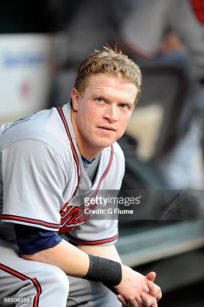 Nate McLouth of the Atlanta Braves sits in the dugout before the game against the Baltimore Orioles at Camden Yards on June 12, 2009 in Baltimore,...