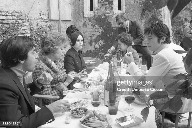 Alain Delon, Brigitte Bardot and the film crew in a lunch break during the shooting of 'Spirits of the Dead' , Rome 1967.