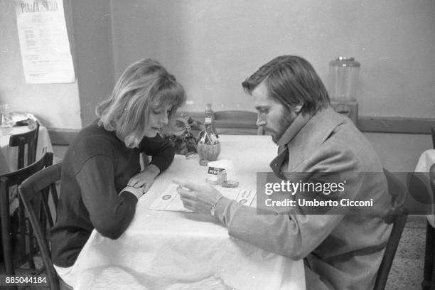 Actress Vanessa Redgrave with actor Franco Nero at the restaurant, Rome 1968.
