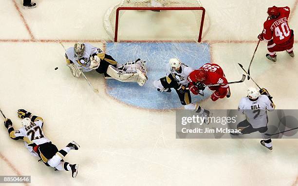 Marc-Andre Fleury of the Pittsburgh Penguins makes a save with one second left in the game against the Detroit Red Wings during Game Seven of the...