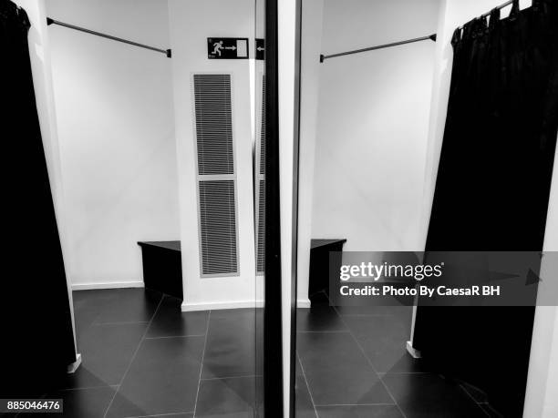fitting room. mirror and reflection. - anprobekabine stock-fotos und bilder
