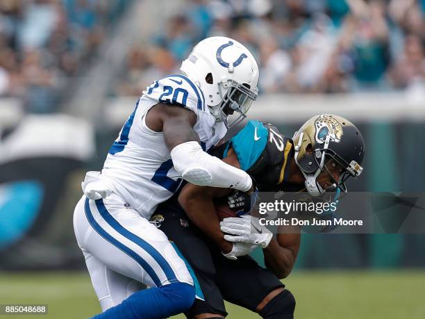 Wide Receover Dede Westbrook of the Jacksonville Jaguars is forced out of bounce by Safety Darius Butler of the Indianapolis Colts during the gameat...