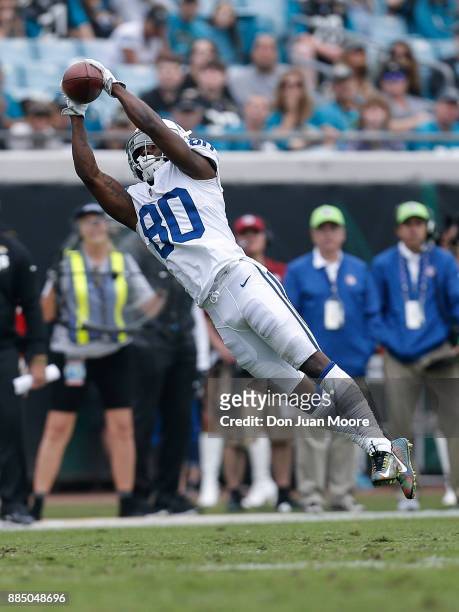 Wide Receiver Chester Rogers of the Indianapolis Colts extends his body out to makes a catch during the game against the Jacksonville Jaguars at...