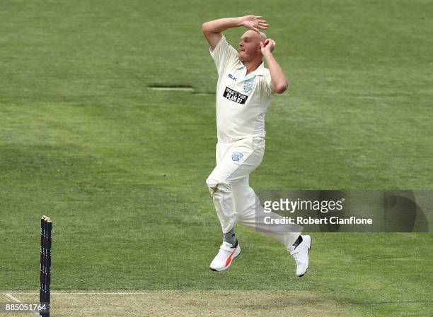 Doug Bollinger of NSW bowls during day two of the Sheffield Shield match between New South Wales and Tasmania at Blundstone Arena on December 4, 2017...