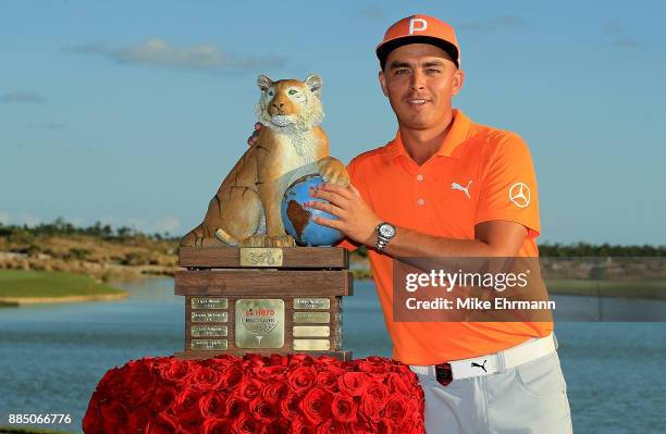 Rickie Fowler of the United States poses with the trophy after winning the Hero World Challenge at Albany, Bahamas on December 3, 2017 in Nassau,...