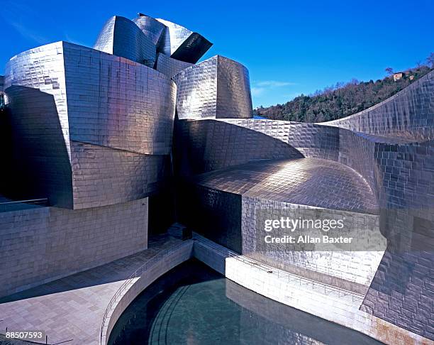 guggenheim museum in bilbao, spain. - bilbo stock-fotos und bilder