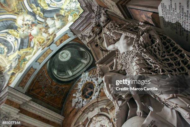 The sculpture of the Disillusionment, by the sculptor Francesco Queirolo, in the chapel of Sansevero.
